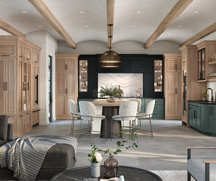 Open-concept quartersawn white oak kitchen with Omega Jaxson cabinetry in a timeless, transitional design.